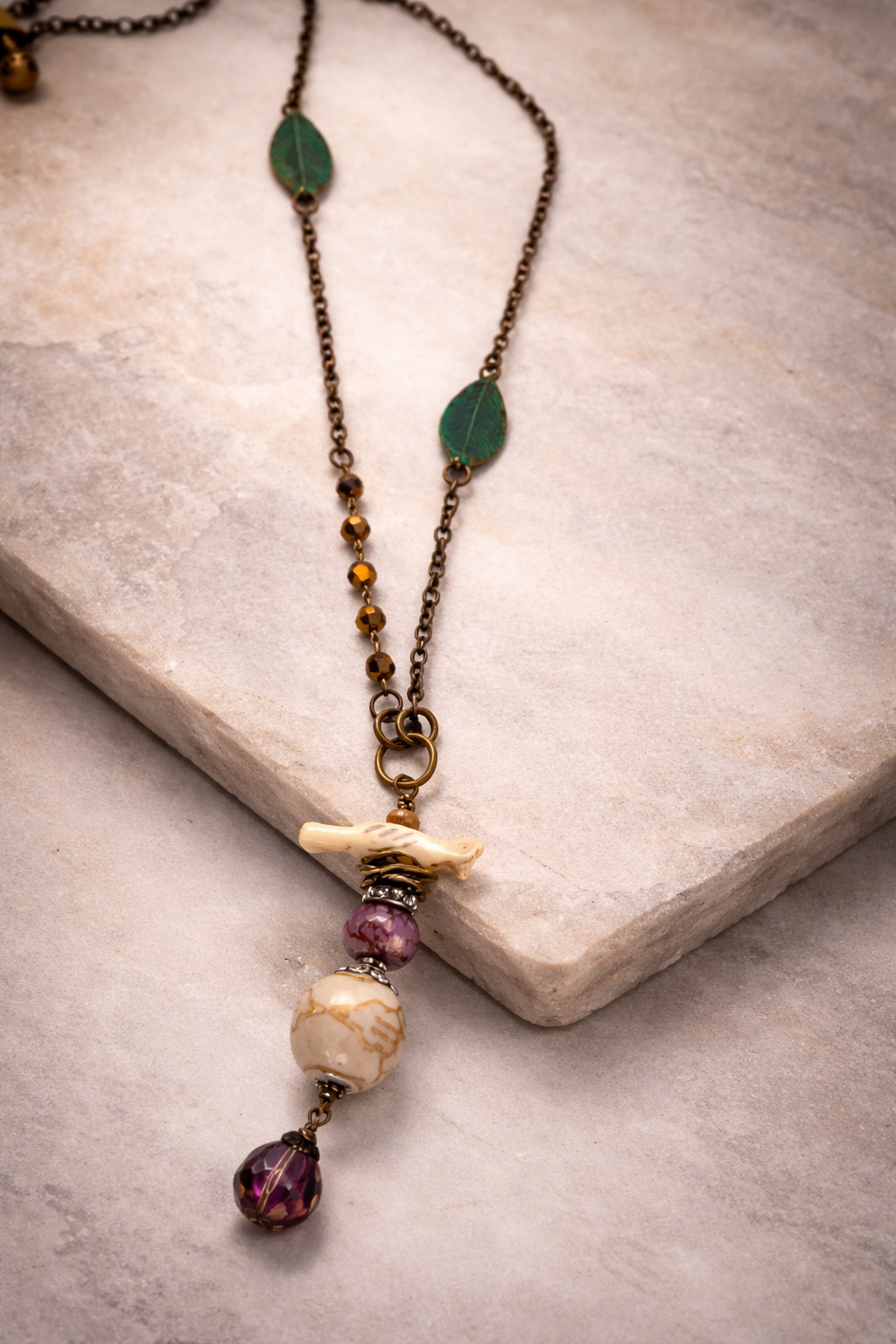Bohemian Bird Nest Necklace – Carved Bird Pendant with Stone & Crystal, Mixed Chain & Verdigris Leaves (32”)