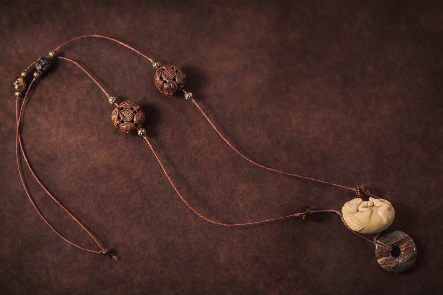 Carved Bodhi Seed & Sleeping Horse Pendant Necklace on Leather – Artisan Boho Statement Necklace