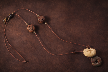 Carved Bodhi Seed & Sleeping Horse Pendant Necklace on Leather – Artisan Boho Statement Necklace