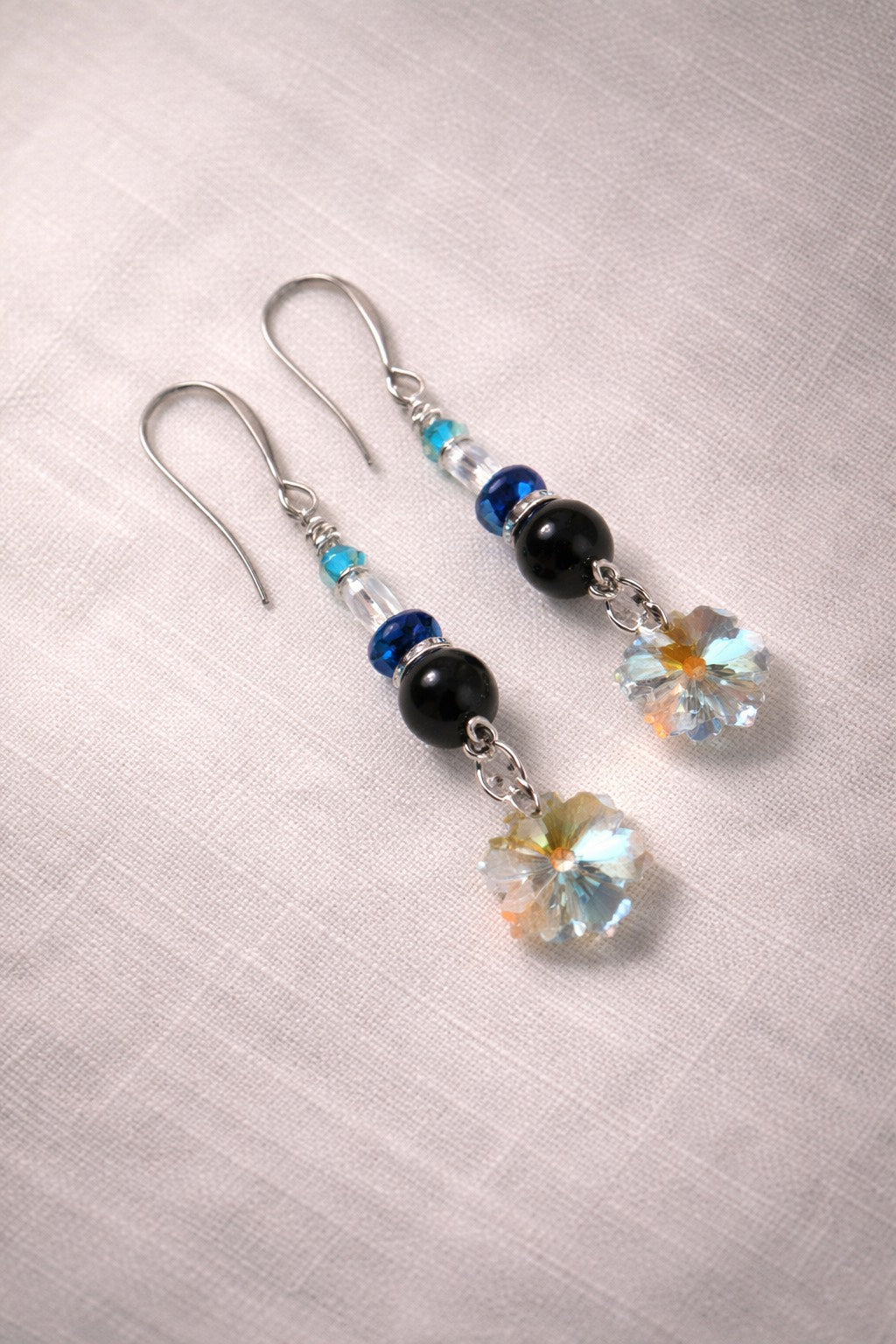 Sparkling snowflakes are surrounded by blue glass and premium crystal