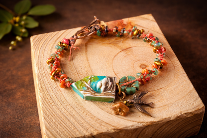 Mountain Song Bird Bracelet – Handcrafted Czech Glass, Polymer Landscape Bead & Bronze Swallow Charm