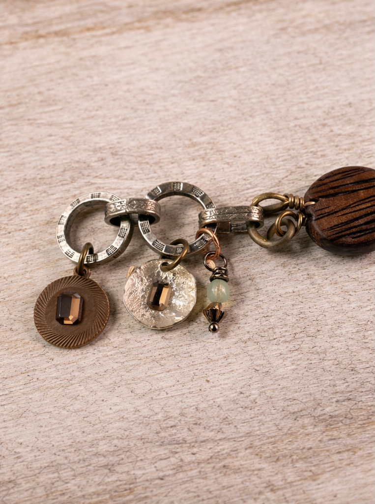 Rust & Rhythm – Mixed Metal & Austrian Crystal Charm Bracelet