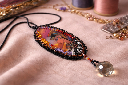 Cleopatra’s Ember – Hand Beaded Egyptian Cabochon Pendant
