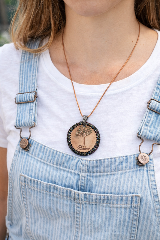 Dreamkeeper Tree Pendant Necklace – Hand-Beaded Clay Medallion on Tan Leather