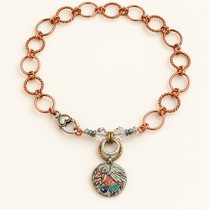 16-inch copper guardian angel necklace with a coral and turquoise handpainted pendant, rhinestone, Swarovski crystals and silver-tone heart lobster clasp.

