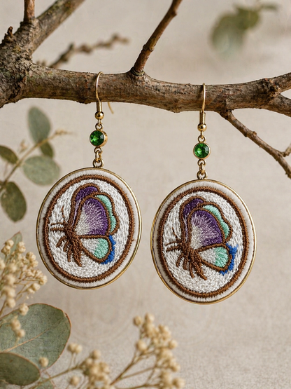 Embroidered Butterfly Earrings – Boho Threadwork Dangles with Green Crystal Accents