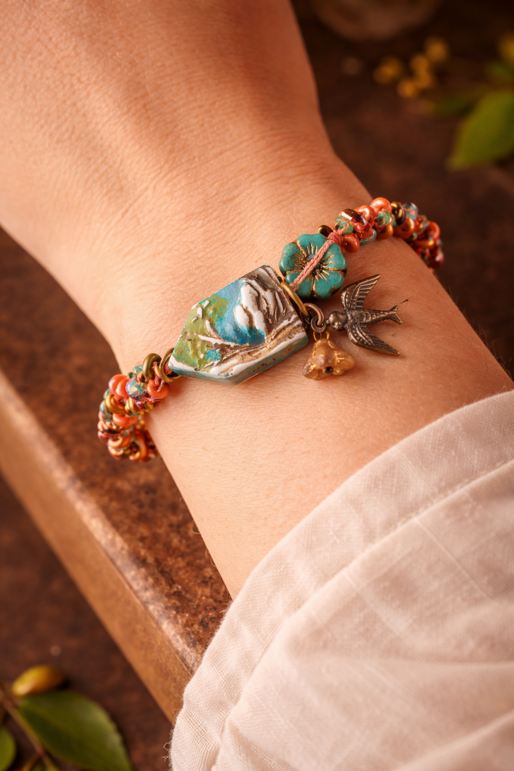 Mountain Song Bird Bracelet – Handcrafted Czech Glass, Polymer Landscape Bead & Bronze Swallow Charm