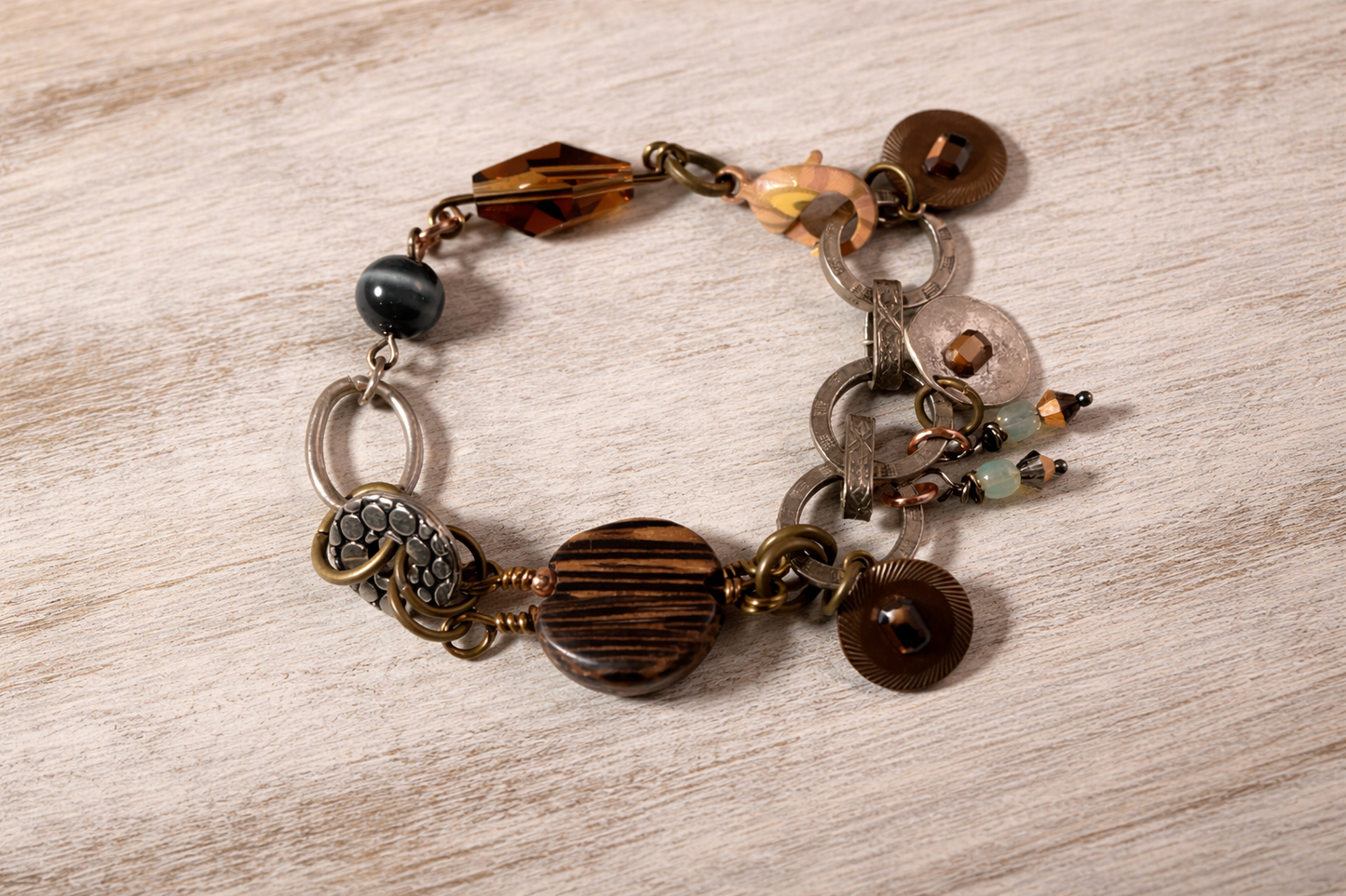 Rust & Rhythm – Mixed Metal & Austrian Crystal Charm Bracelet