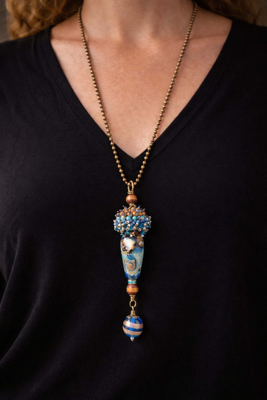 Eye of the Storm Necklace – Ocean Swirl Glass & Hand Beaded Statement Pendant