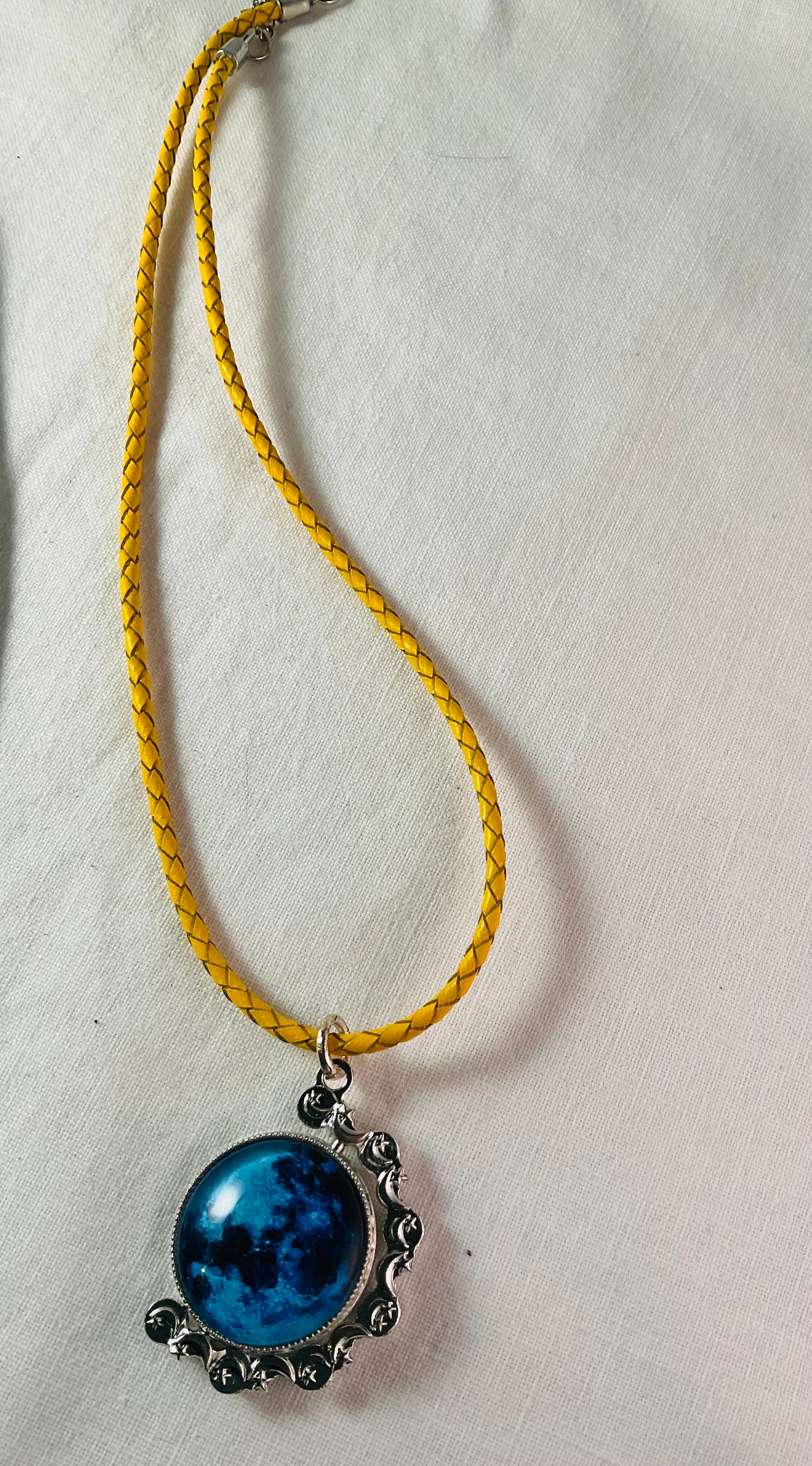 Necklace - Swiveling Moon and crystal on silver frame