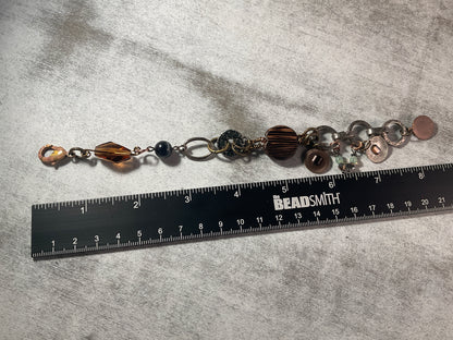 Rust & Rhythm – Mixed Metal & Austrian Crystal Charm Bracelet