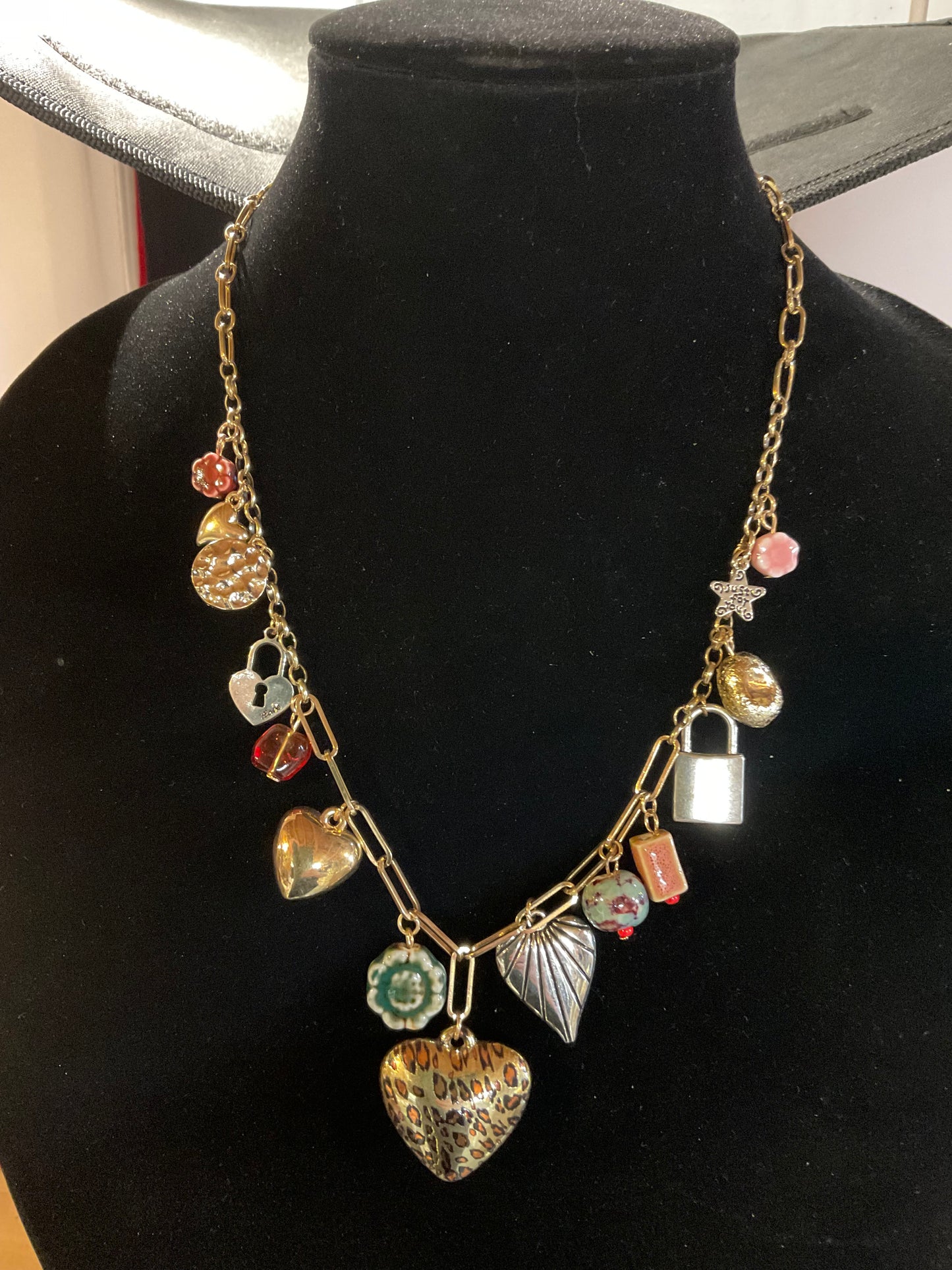 Eclectic Heart & Lock Charm Necklace – Gold Chain with Leopard Heart, Ceramic Beads & Mixed Metal Charms