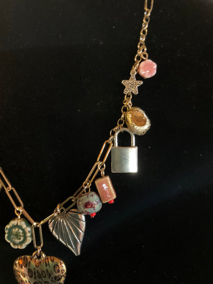 Eclectic Heart & Lock Charm Necklace – Gold Chain with Leopard Heart, Ceramic Beads & Mixed Metal Charms