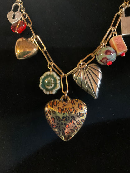Eclectic Heart & Lock Charm Necklace – Gold Chain with Leopard Heart, Ceramic Beads & Mixed Metal Charms