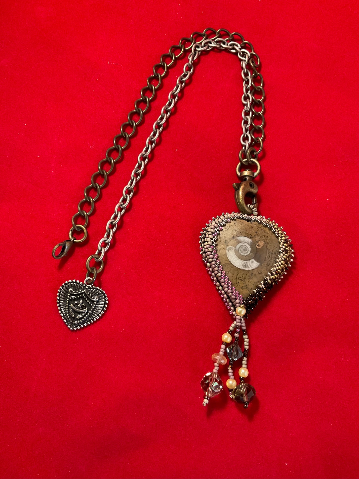 Ocean Relic – Embroidered Nautilus Crystal Talisman Necklace”