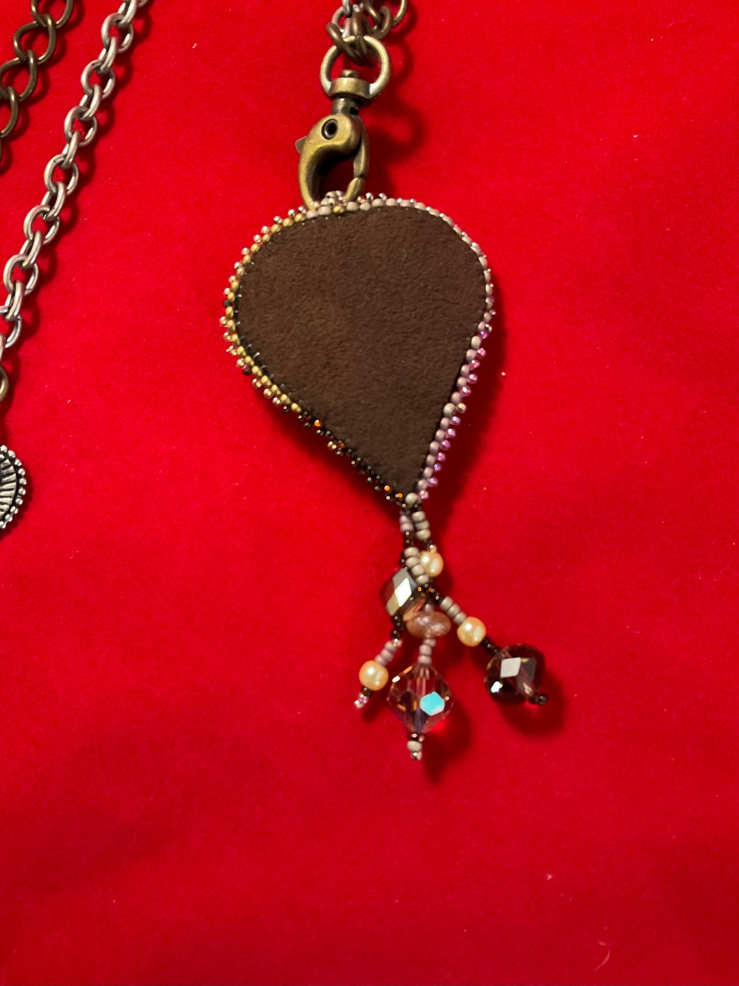 Ocean Relic – Embroidered Nautilus Crystal Talisman Necklace”