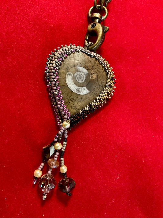 Ocean Relic – Embroidered Nautilus Crystal Talisman Necklace”