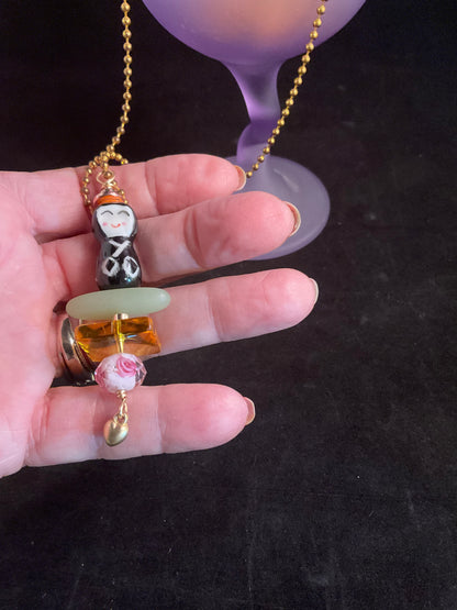 Little Peace Doll Necklace – Ceramic Asian Figurine with Glass & Heart Charm (30” Chain)