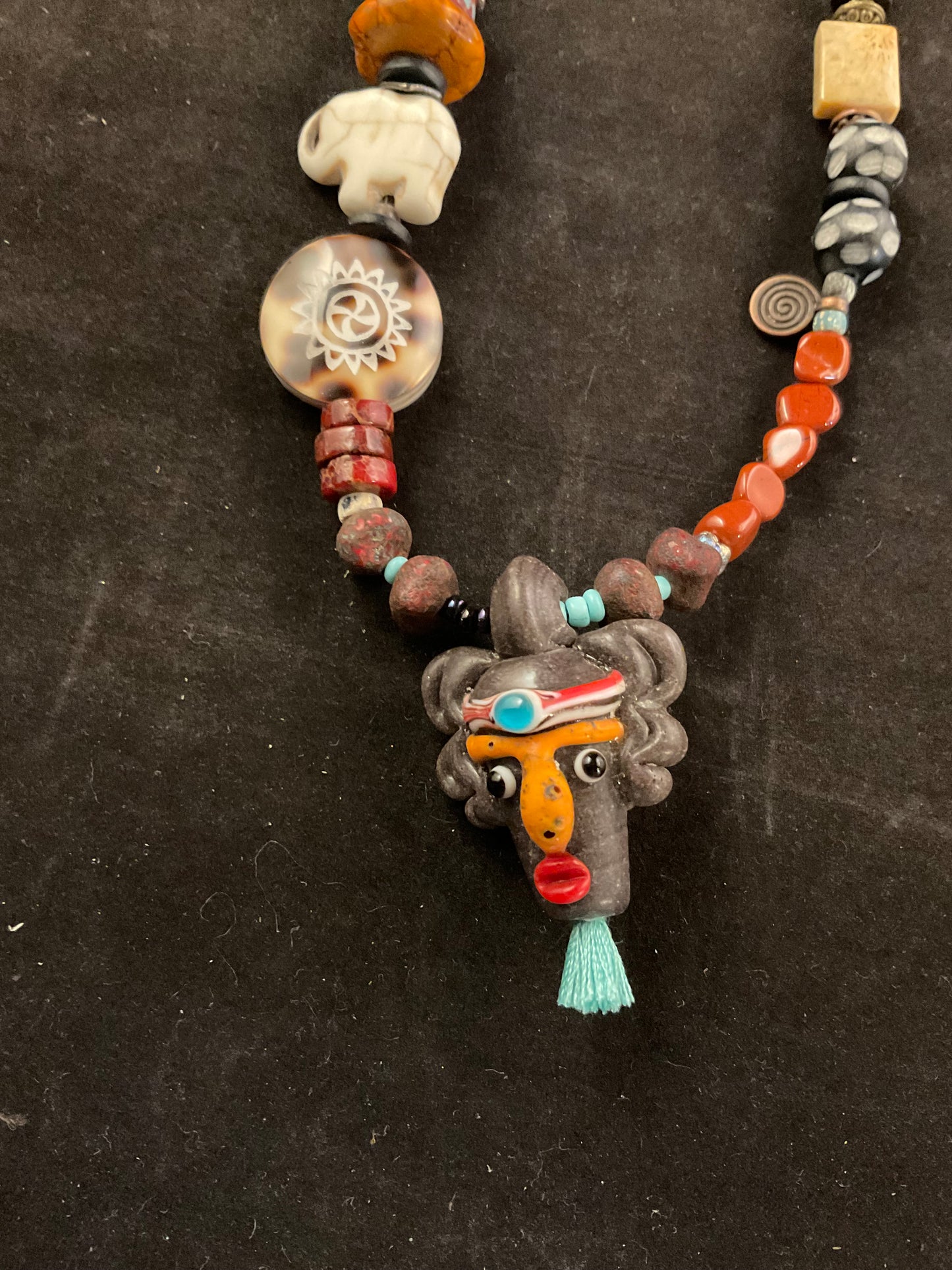Tribal Rhythm Goddess Necklace – African Bead Statement Necklace with Double-Sided Clay Face Pendant